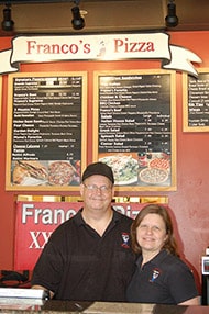 Mark and Deb Petersen are ready for your delivery or take out order.