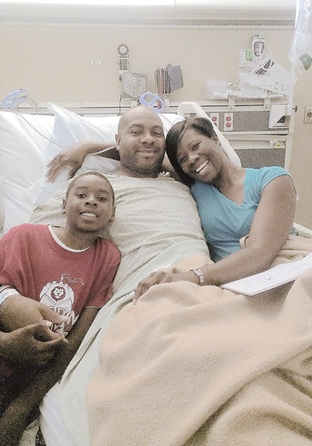 The three of us in the hospital bed - we titled, "The day Daddy woke up"