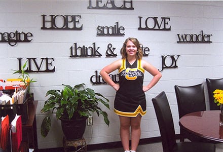 Central Gwinnett High School Senior Lauren Lindblad greets visitors to the Central Gwinnett attendance office with a big beautiful smile.