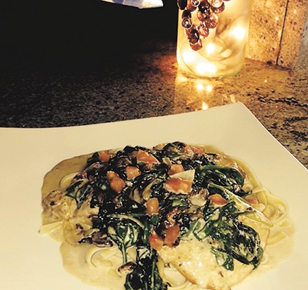 Chicken Boscaiola:  Chicken sautéed with shallots, mushrooms, bacon, fresh tomatoes, and spinach, in a light cream sauce