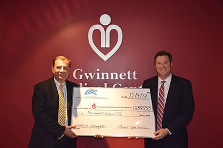Stan Hall, executive director of the Gwinnett Sports Commission, and Jason Chandler, president of the GMC Foundation