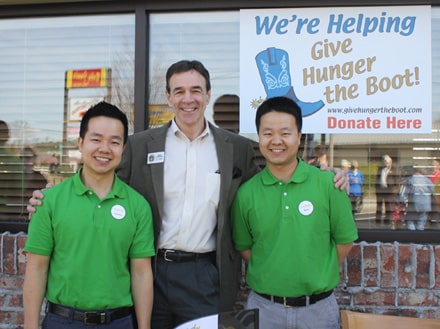 From left, Jim Chen, Councilman Dave Emanuel and Ken Chen at the ribbon cutting event at the Rice Box on Highway 78 Saturday. The Chens donated more than $300 to Give Hunger the Boot, a charitable organization founded by Emanuel.