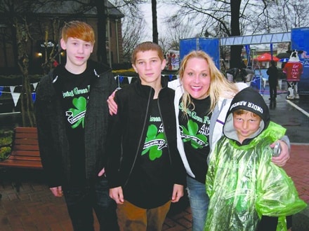 Vanessa Churco with her two sons and friend, volunteer.