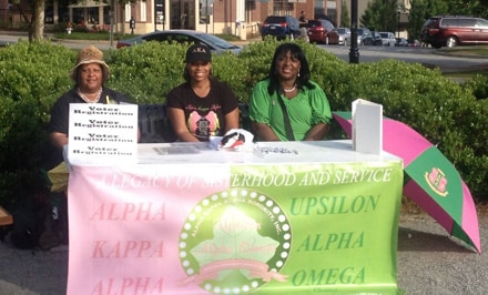 Sisters of UAO "mobilized the movies" with a Voter Registration Drive at Suwanee Town Park's "Movies Under The Stars"