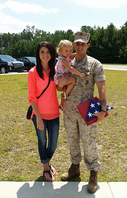 Cpl. Jarred Duncan, Grand Marshall for the Wounded Warrior Project fundraiser with his wife Lauren and daughter Sofia.