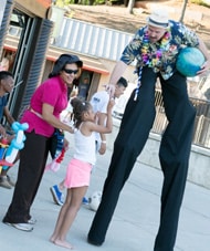 lake A Stilt Walker Entertains a Pint Sized Full Moon Party Patron 190