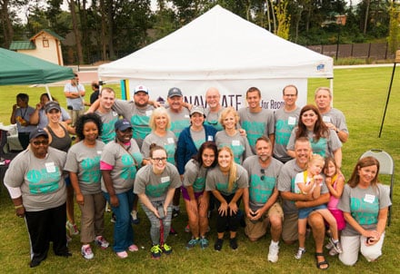 The Navigate Recovery Team: Founders Susan (2nd row, 4th in from left) and Farley Barge (3rd row with sunglasses) with Navigate Recovery volunteers at their Run for Recovery event last fall.