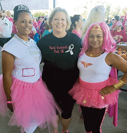 Bobbie Menneg (Center) with two Paint Gwinnett Pink 5K participants/survivor.