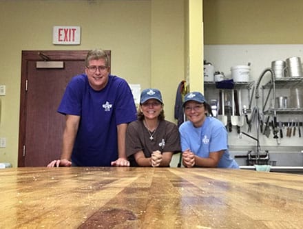 Kim Kiser (Middle) with Rob and Traci Browne, are owners of Great Harvest Bread and ready to serve you!