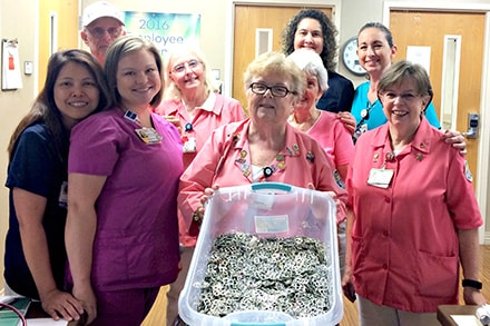  Ruth Bridges (center) recognizing Eastside’s Joint and Spine unit for collecting the most soda can tabs for second quarter 2017 to be donated to the Ronald McDonald house campaign.