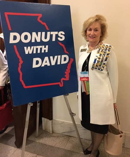 "Donuts with David" sign with Regent Kitty Watters