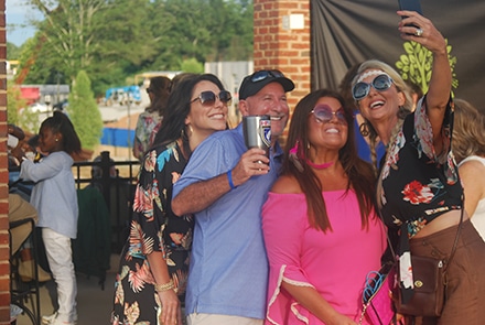  Sugar Hill Mayor Steve Edwards snags a selfie with some longtime disco fans.