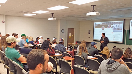 Burkhalter speaking to students at the University of Georgia, about LinkedIn and personal branding. 