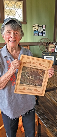  Ann Parsons Odum’s painting of the Duluth Depot graced the cover  of the Duluth Fall Festival program in September, 1986.