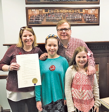 Karen Thieken was supported by  daughters Colleen and Katie and husband Paul, when she addressed lawmakers at the state capitol about sepsis awareness