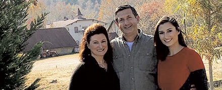 Edward Sezonov with his wife and daughter