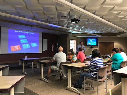 Captain Jeff Smith provides an overview of the Lawrenceville Police Department’s organizational structure. Three captains provide oversight of the three bureaus within the department that include: uniform services, investigative services, and support services. 