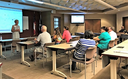 Lawrenceville’s Mayor Judy Johnson encourages attendees to sign up and participate in the Lawrenceville Citizens Police Academy. 