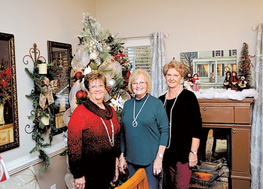 Brenda Bedingfield (Center) with friends Sue Briscoe (Left) and Starr Hendrick (Right) enjoy an afternoon at Brenda’s home with Christmas cheer.