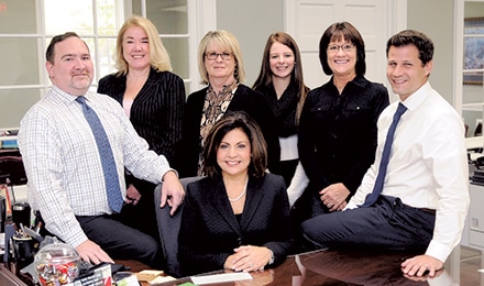 The staff at United Community Bank in Snellville. (L-R) Chris Lee, Kathleen Knight, Tami Rhine, Amber Bowman, Rae Merck, Nathan Umberg and Snellville Branch Manager Ginger Kilman (Center).