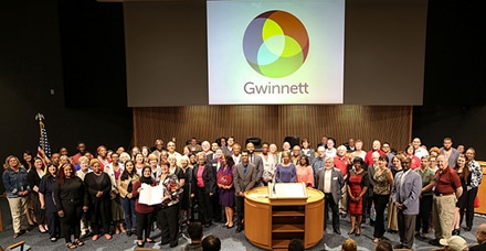 Volunteer Gwinnett Coordinator, Muriam Nafees and Board of Commissioners Chairman, Charlotte Nash holding the National Volunteer Week proclamation that was presented at the April 24, 2018 Board of Commissioners meeting at the Gwinnett Justice and Administration Center.