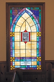 Beautiful stained glass windows surround the original sanctuary, many of them honoring families who were members at the church for years.