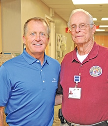 Joint Destinations volunteer Bill Farris with Fred Funk.