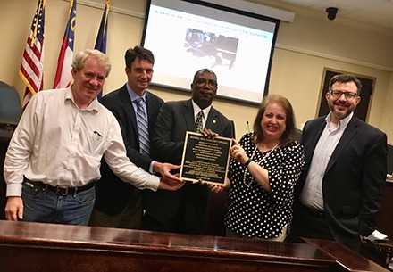 At Monday’s City Council meeting, Norcross Mayor Craig Newton and councilmembers recognized all of those who have contributed countless hours and support into bringing the Mitchell Road Mosaic Wall to life. Pictured left to right: Dan Watch, Norcross City Council; Josh Bare, Norcross City Council; Craig Newton, Norcross Mayor; Lynette Howard, Gwinnett County Board of Commissioners; Andrew Hixson, Norcross City Council