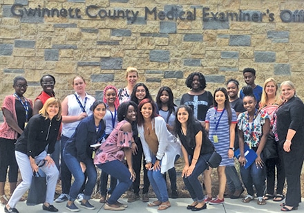 S.M.I.L.E. Gwinnett participants visiting the Gwinnett County Medical Examiner’s with State Court Judge Pam South, Magistrate Judge Kim Gallant, Assistant Solicitor Dana Pagan, and South Gwinnett teacher Rebecca Streetman.