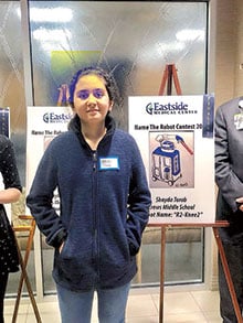 Alton C. Crews Middle School student and Eastside Medical Center name our Robot Contest Winner Shayda Torab, at Eastside’s October 25 event.