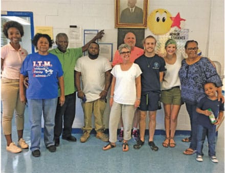 Mike and Terri Emery visiting staff and friends at I.T. Montgomery Elementary in Mound Bayou, Miss.