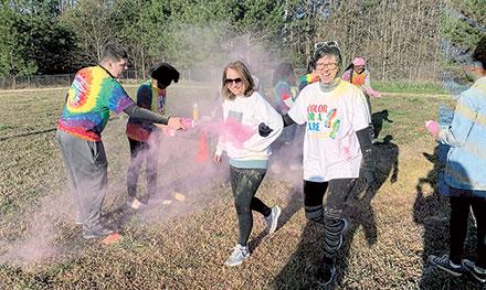 Runners enjoyed clear skies at Dacula High School’s first CURE Color run.