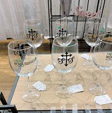  For mothers whose children attend Buford High School Wolves, Sweet Tea and Sisters offers an assortment of wine glasses with clever puns — “The Real Howlswives of Buford”.