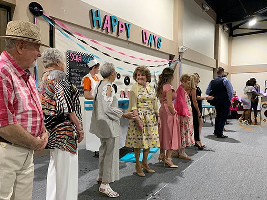 Participants lining up onstage to take a final bow at the 2019 Buford Lanier Woman's Club Fashion Show.
