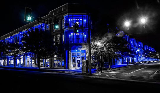 The Cornerstone building in downtown Lawrenceville got a head start at the city's "Light Lawrenceville Blue". The neighborhood had 100 percent participation with every resident and local businesses NovoLogic and Cornerstone CoWorking supporting the effort.