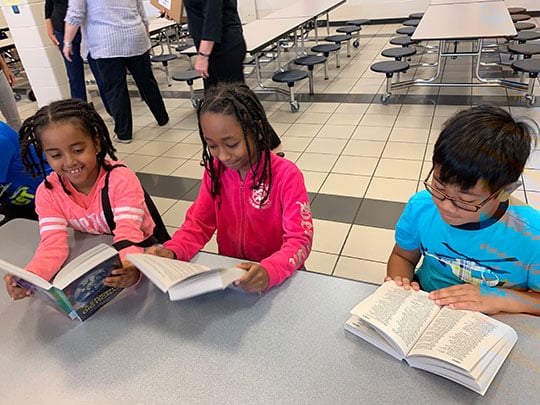 Arcado Elementary students skimmed their new dictionaries provided by the Lilburn Woman’s Club and their local partners. The Club proposed and achieved their goal to give each third-grade student in Lilburn’s public schools their own dictionary because “third grade is when children begin transitioning from ‘learning to read’ to ‘reading to learn.’”