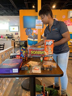 At Sweet Joy Ice Cream Bar, Talia Holmes welcomes children, adults and groups to come have a karaoke night, play a game like Uno and Janga, or just kick back and watch a Disney movie while enjoying their preference of a frozen treat.