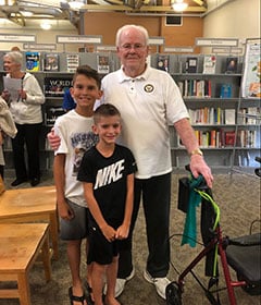 Bill York with two young members from the audience after his presentation at the Dacula Library. L-R: Conner O'Lenick, 10 Asher O'Lenick, 7, and Bill York.