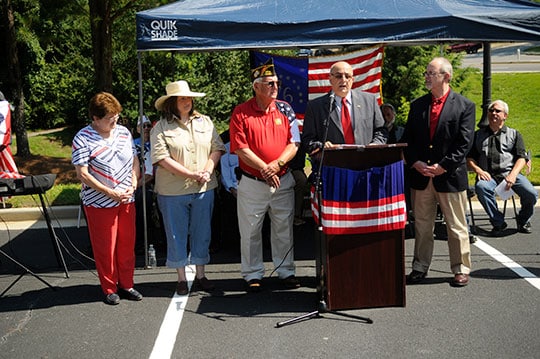  L-R — Pat Sims, Ranate Patrick, Commander Jim Jackson, Mike Sabbagh at the Podium and Warren Auld.