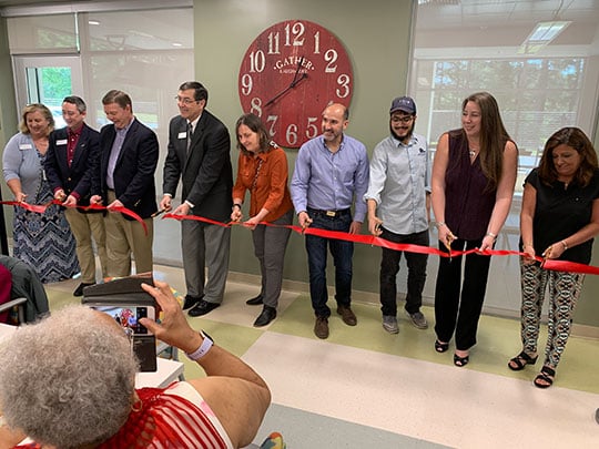 Cutting the ribbon at Norcross Senior Center.