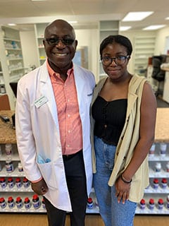 Complete Care Pharmacy owner Ken Kwarteng and his daughter, Mia Kwarteng, at the Grand Opening Celebration. Mia is in high school and enjoys seeing her dad bring his dream to life in opening his own pharmacy.