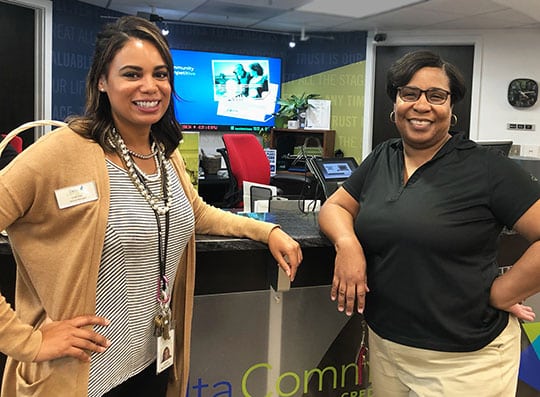 Branch Manager Carisa Buffington, left, and Member Service Agent Karen Harmon at the Delta Community Branch in Buford.