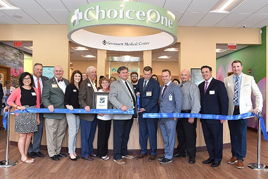 The Ribbon Cutting for the new ChoiceOne Urgent Care Center operated by Gwinnett Medical Center was held July 11, 2019 from 5-7 p.m. L-R: Laura Benesch, Rob Shek, Mike Levengood, Sandy Richardson, Phil Wolfe, Beckie Smith, Thomas Shepherd, Michael "Mike" Boblitz, Dr. Scott Burger, Rodney White, Butch Marino, Stephen Munier.