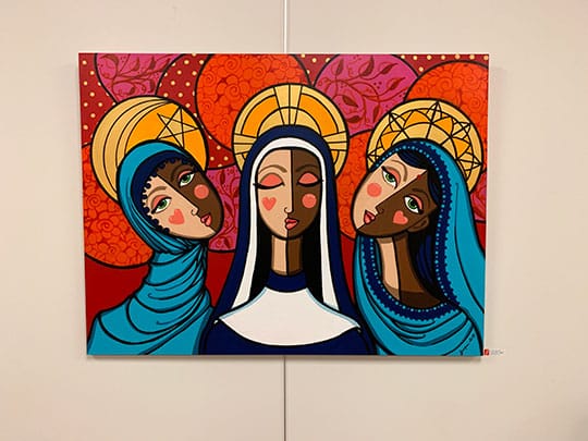 Jacqi Miller's "Sisterhood of the Covered Head" on display at the City of Sugar Hill. Jacqui's work was displayed alongside Richard Shiver's pottery at the "Clay and Canvas"  Artist of the Month exhibit curated by the Sugar Hill Arts Commission.
