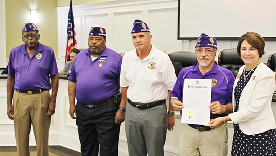 Members of the Military Order of the Purple Heart Chapter 465 receiving a proclamation from Mayor Barbara Bender at the City of Snellville on August 12, 2019. L-R: Robert Nelson, Adjutant; James Gordon, Department Adjutant; Don Bullard, Trustee; Lou Zayas, Commander, and Mayor Barbara Bender. Photo by Brian Arrington.--Please include this in caption since he is the public Information officer in Snellville.