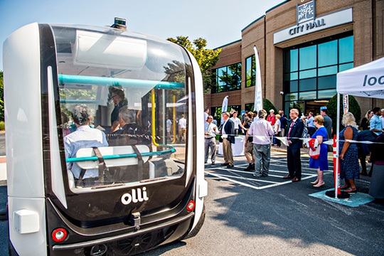 Guests at the grand opening event got a chance to ride Olli, a Local Motors 10-seat autonomous shuttle  