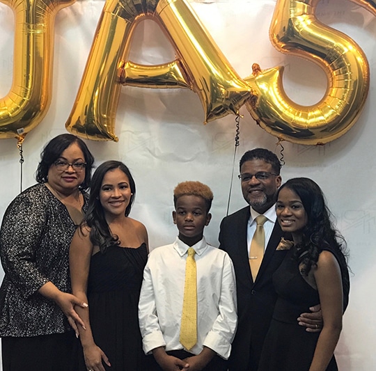 The Newsome family. L-R: Aprile Newsome, Teylor Newsome, Giovanni Newsome, John Newsome, and Sydnee Newsome, a senior at Faith Academy. Teylor, who lives in Atlanta, did not witness the accident but immediately rushed to the hospital once she learned what happened.
