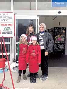 Rotarians and family Bell ringers for the Salvation Army in December 2019.