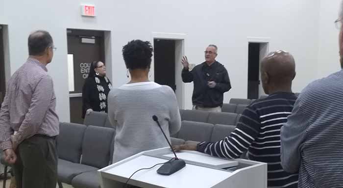 Lilburn Police Chief Bruce Hedley took the students on a tour of the new police building, including the city courtroom (shown).
