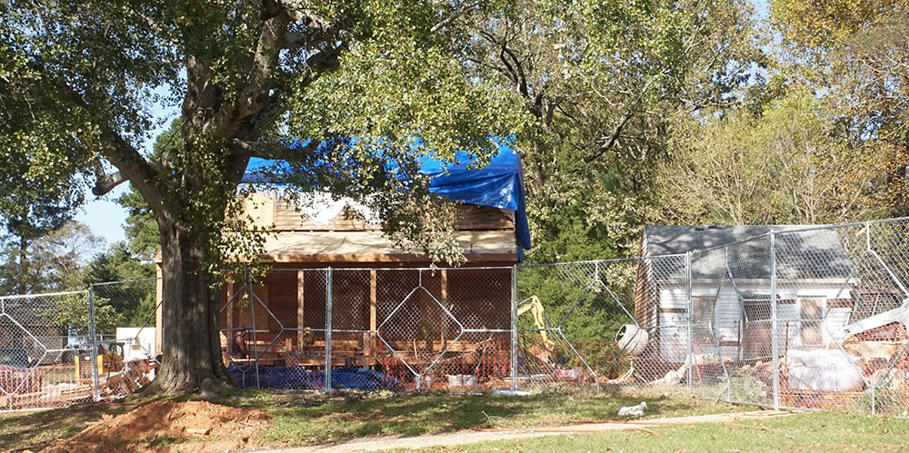 The Hudson-Nash Home, now being reconstructed on Five Forks Trickum Road as part of the Yellow River Post Office Park.  It was moved there from across the street in 2019.  An early resident, Thomas Hudson, owner of 500 acres near the Yellow River, was the postmaster and proprietor of the general store.  Hudson supported Hudson’s Guards, a local Confederate militia, during the Civil War.  No major battles were fought in this area, but five Union soldiers were killed at a skirmish at the Yellow River Bridge.
